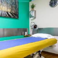 Fotografía de las instalaciones, se visualiza Cuarto de masaje Ozonklinikat